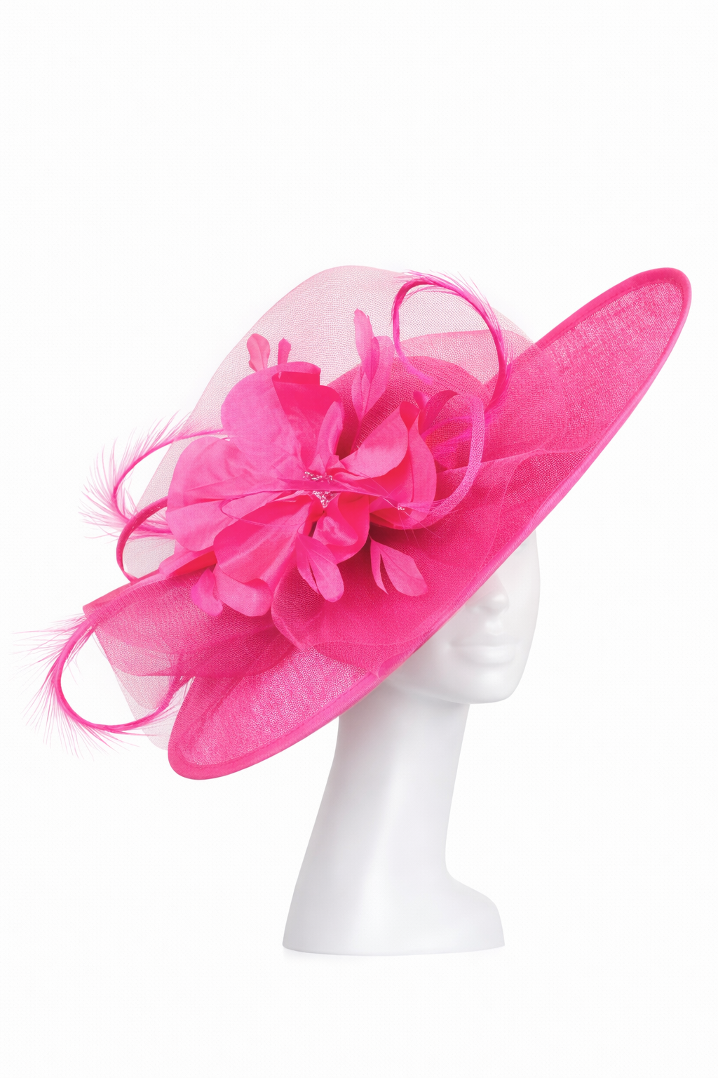 Pink decorative hat on a mannequin head against a white background