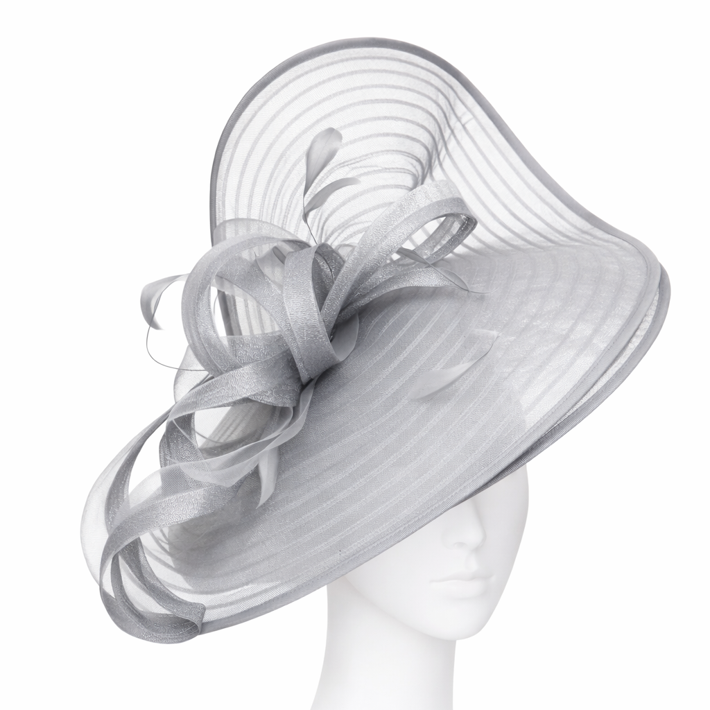 White decorative hat on a mannequin head against a white background