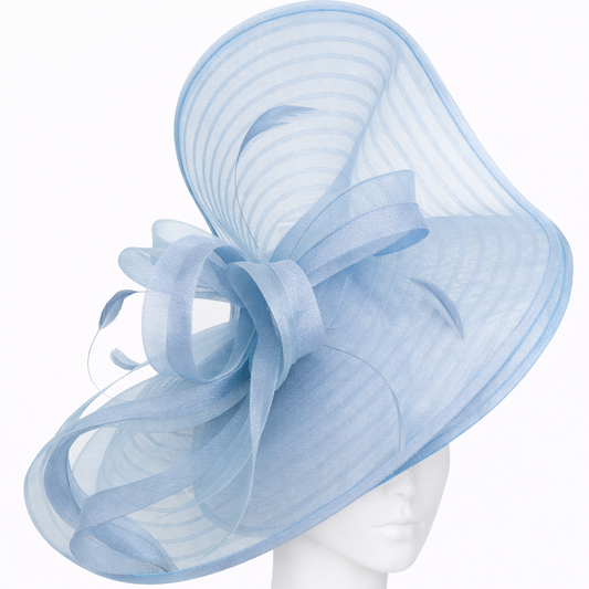 Light blue decorative hat on a mannequin head against a white background